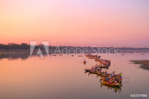 Picture of Traditional burmese boats on Taungthaman Lake at sunset in Amarapura Mandalay Myanmar